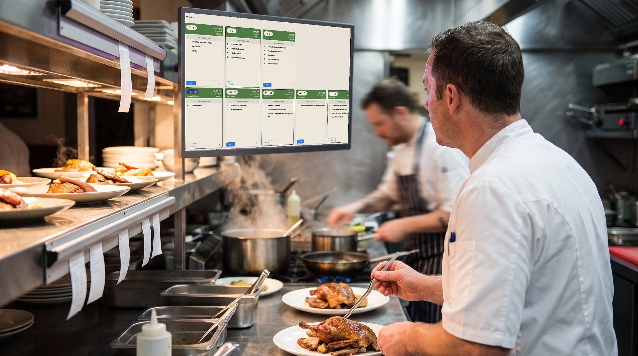A chef plating at the pass, reading orders on the Asky kitchen display